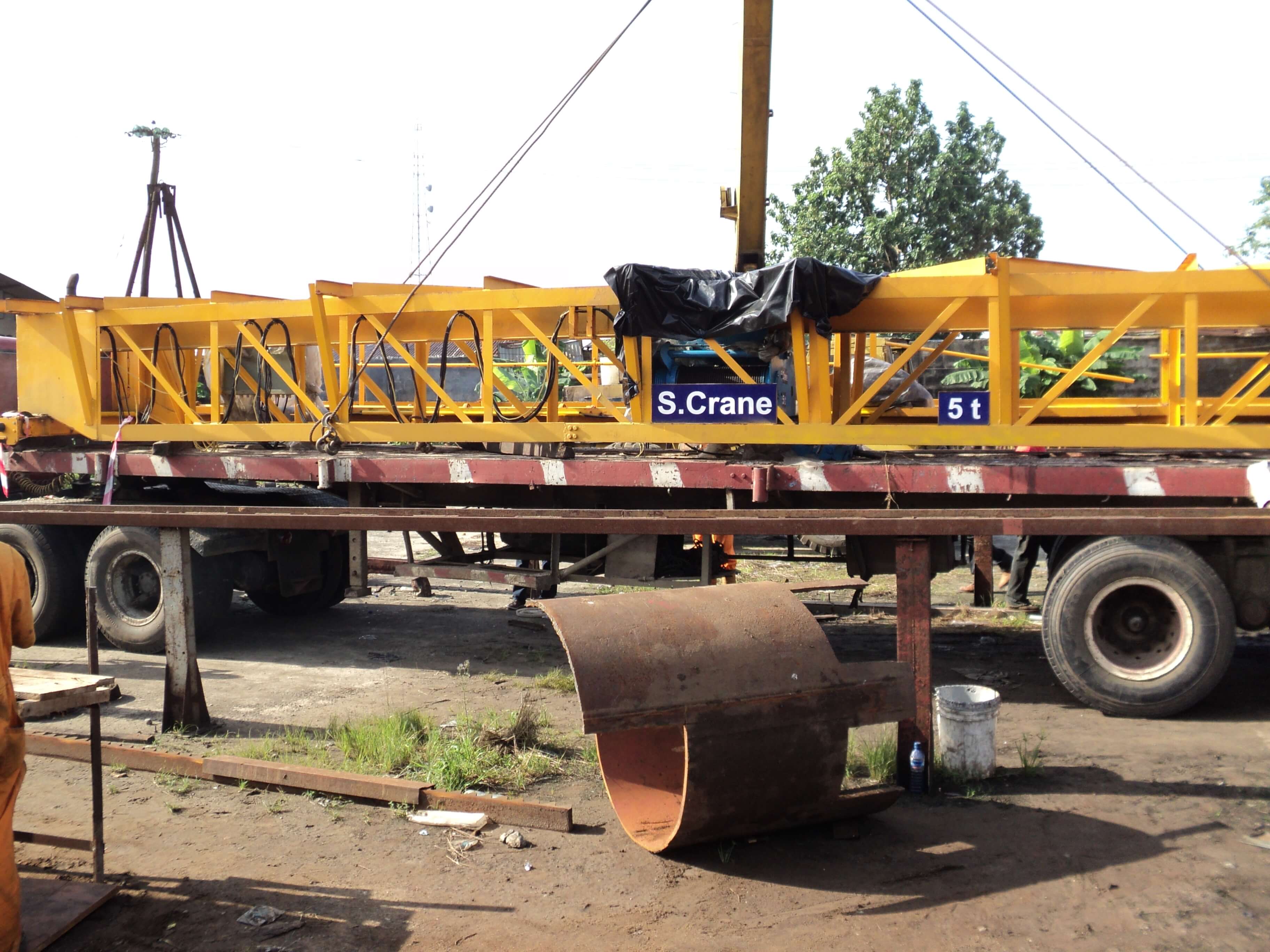  <br /> 2. Above displayed 5TON ELECTRIC OVERHEAD TRAVELING(EOT) Crane with an open Lattice Crane Girder spanning 13.8m being loaded in our Yard for transport to installation.
                            